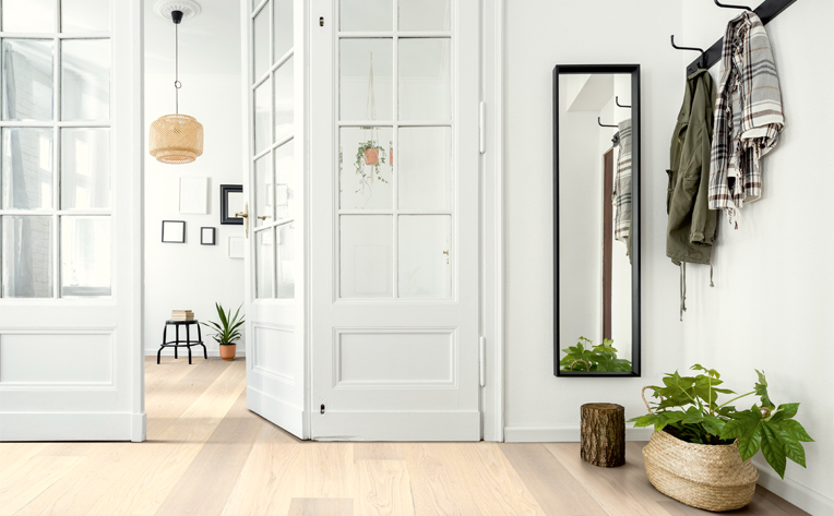 light wood flooring in mudroom